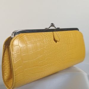 This is a Leather Clutch Yellow Purse.